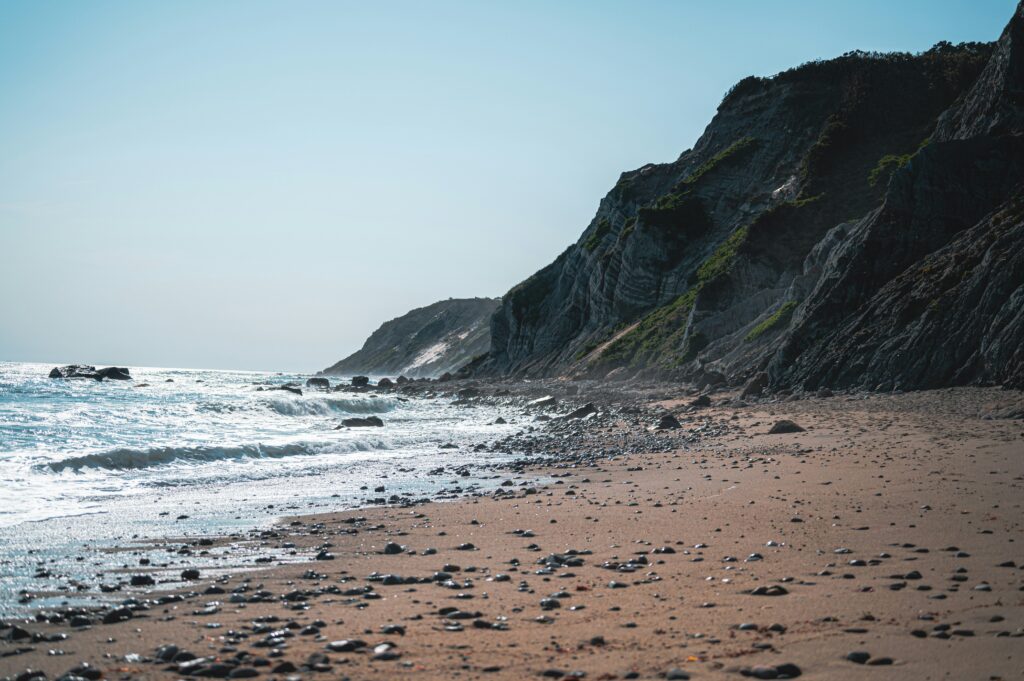 A photo of Mohegan Bluffs and beach on Block Island, Rhode Island.