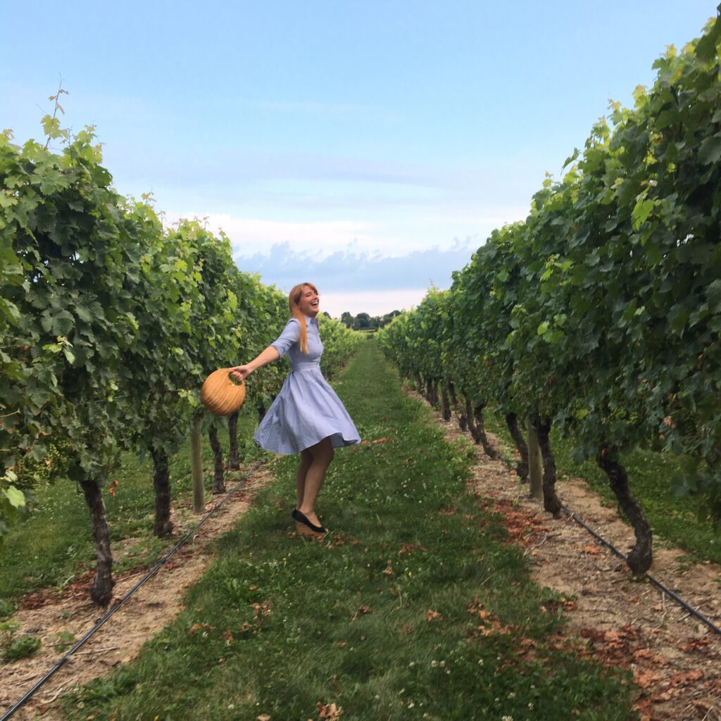 Girl having fun at a vineyard.