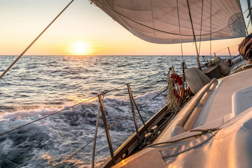 Sailing a 12 meter yacht on Narraganset Bay in Newport, Rhode Island. 