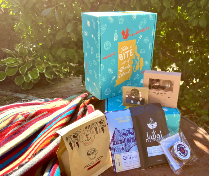 A photo of a gift box with chocolate foods.