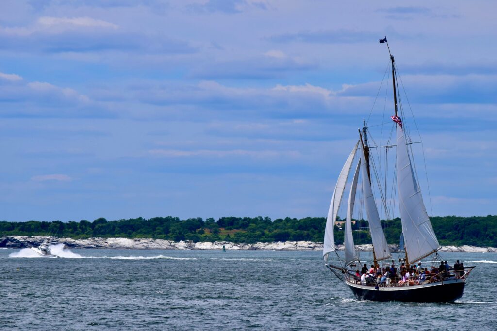 A photo of a boat sailing on Narragansett Bay in Rhode Island.
